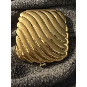 Vintage Powder Compact Estée Lauder post 1960 Gold with blue rhinestone clasp